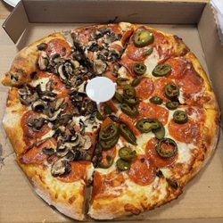 Uncle Ernie's Pizza - Half pepperoni and mushrooms, half pepperoni and jalapeños pizza. My half was the half with the jalapeños.