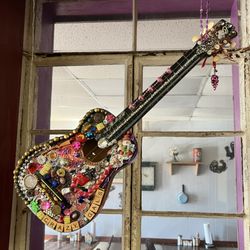 Mama's Home Cooking - On display here: Cool guitar emblazoned with stuff