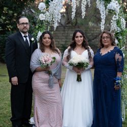 All these exquisite dresses and the handsome tuxedo were acquired from this charming boutique.