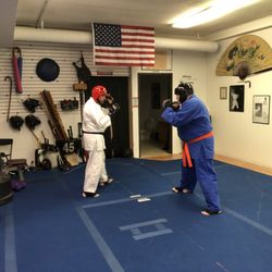 Wolf Den Martial Arts Academy - Our adults enjoying some light sparring to relieve some of the stress of the week.