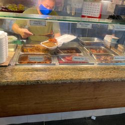 New Grand Chinese Kitchen - Owner making a dinner