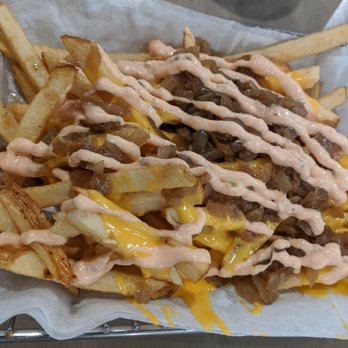 Burger Boss - Boss fries with Thousand Island, nacho cheese, and grilled onions + black pepper - Burgers Near Me - Tustin, California Burger Boss - Boss fries with Thousand Island, nacho cheese, and grilled onions + black pepper - Burgers Near Me - Tustin, California