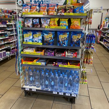7-Eleven - a display of bottled water in a grocery store - Convenience Stores Near Me - Orlando, Florida 7-Eleven - a display of bottled water in a grocery store - Convenience Stores Near Me - Orlando, Florida