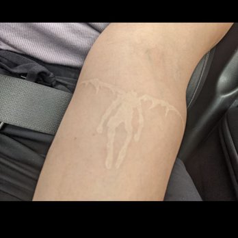 Flesh Wound Tattoos - One month later, white ink Ryuk silhouette - Tattoo Near Me - Downey, California