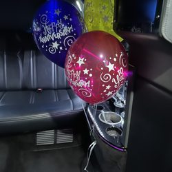 Dumas Bay Limousine - Limo with anniversary balloons