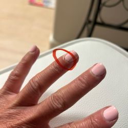Olive Nails Spa - Cuticles cut completely.   Ring finger red and inflamed even two days later.  It hurts whenever I wash my hands etc....frustrating.