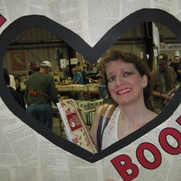 VNSA made this photo frame for us (made out of cardboard). I am holding it up. Reminds me of Polaroid. Yes, I (heart) books ;) VNSA made this photo frame for us (made out of cardboard). I am holding it up. Reminds me of Polaroid. Yes, I (heart) books ;)