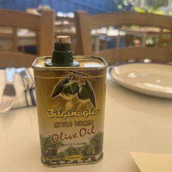 Mandolin Aegean Bistro - Table side olive oil - Mediterranean Near Me - Miami, Florida Mandolin Aegean Bistro - Table side olive oil - Mediterranean Near Me - Miami, Florida