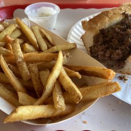 Cheesesteak, sub, and french fries.