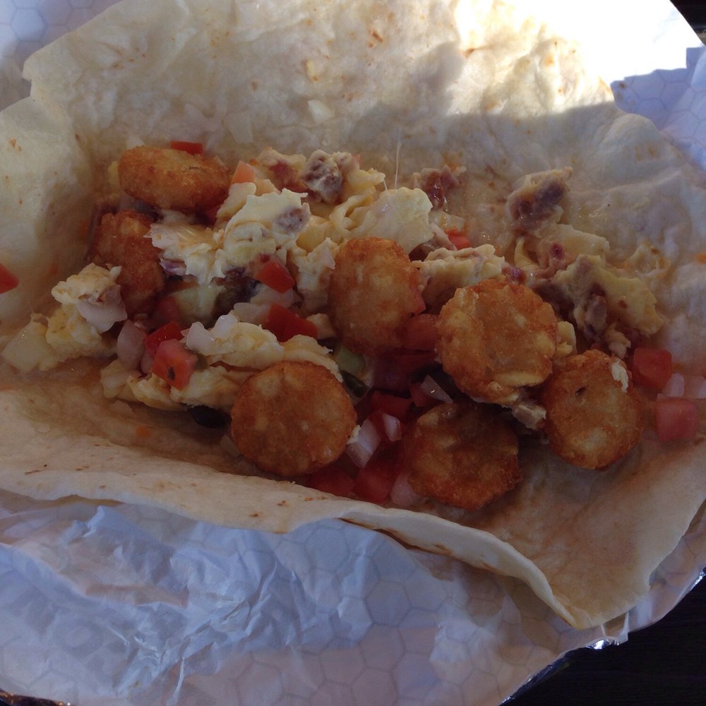 Loaded burrito with under cooked onions