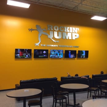 Rockin Jump Modesto - 4 televisions and one in the middle is the live video feed of the kids bouncing! - Trampoline Parks Near Me - Modesto, California