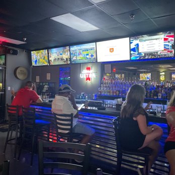 Drunk'n Monkey - people sitting at a bar - Sports Bars Near Me - New Port Richey, Florida Drunk'n Monkey - people sitting at a bar - Sports Bars Near Me - New Port Richey, Florida