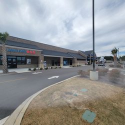 Food Lion - Shares a wall with regular Food Lion, but has a separate entrance. You have to exit liquor store to get inside grocery store next door.