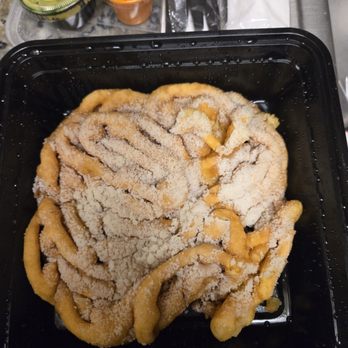 Dona Leti's - Funnel cake topped with cinnamon and powdered sugar So good! - Cocktail Bars Near Me - Houston, Texas