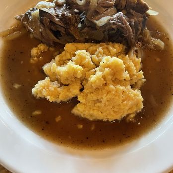 Niner Wine Estates - Short ribs over polenta. Again, sauce called for dipping the bread into. - Wine Tasting Room Near Me - Paso Robles, California Niner Wine Estates - Short ribs over polenta. Again, sauce called for dipping the bread into. - Wine Tasting Room Near Me - Paso Robles, California