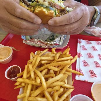 Papa Smash - Half eaten double classic smash......we were excited to try it all! - Burgers Near Me - Beaumont, California