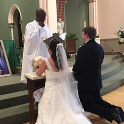 St. Sylvester Church - Rev. Mukundi giving final blessing.