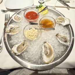 Half dozen Jimmy Fund Gold oysters with horseradish, cocktail sauce and apple chile mignonette