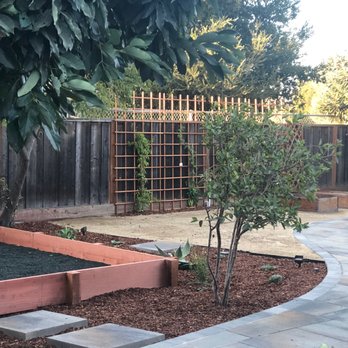 Affordable Landscape & Design - After - golden sand and play area - Landscaping Near Me