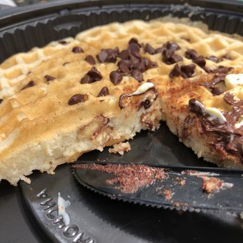 Waffle House - Our choco chip pancake that unexpectedly came with pecans. Good thing I like nuts and am not extremely allergic to them! - American Near Me - Austin, Texas