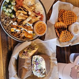 berliner bowl, Mediterranean wrap, sweet potato fries berliner bowl, Mediterranean wrap, sweet potato fries