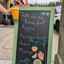 O Smoothie - Ooh La La Passion Fruit smoothie. Contains apple, passionfruit, peach, and mango. Cold, refreshing, and delicious. $9.78 after tax and tip.