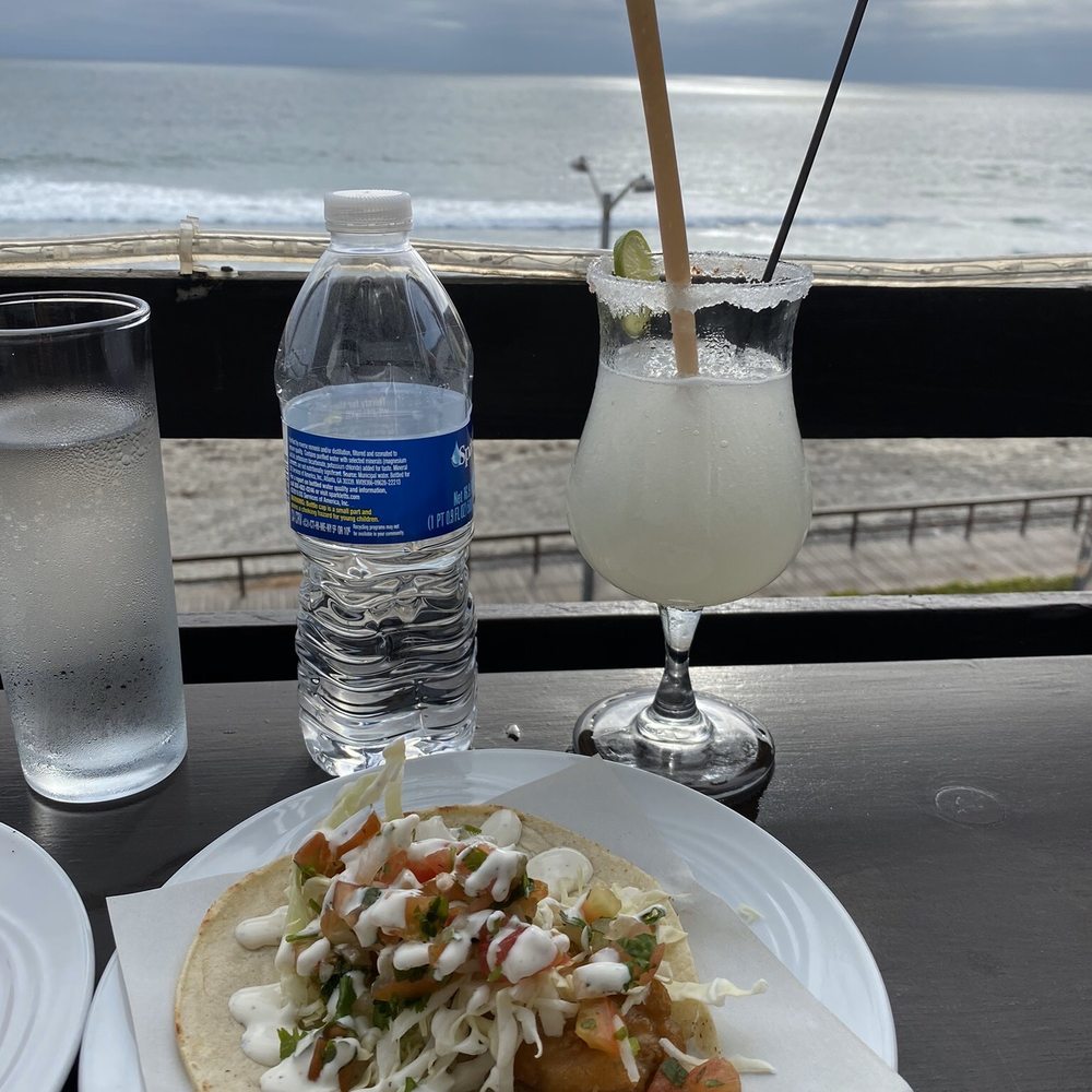 Rocco's - Battered fish taco and margarita on the balcony facing the beach - Seafood Near Me - Tijuana, BCN Rocco's - Battered fish taco and margarita on the balcony facing the beach - Seafood Near Me - Tijuana, BCN