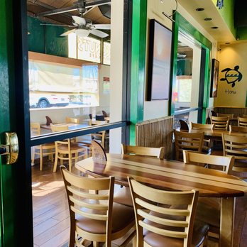 Maui Fish House - View from indoor dining to covered outdoor dining with ceiling fans. - Seafood Near Me - Phoenix, Arizona Maui Fish House - View from indoor dining to covered outdoor dining with ceiling fans. - Seafood Near Me - Phoenix, Arizona