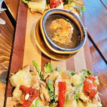 Beerwood - TUSCAN CHICKEN FLATBREAD. Melty cheese, chicken, basil, pinenuts, sundried tomatoes, & herbed vinaigrette drizzle. - Beer Bar Near Me - Los Osos, California