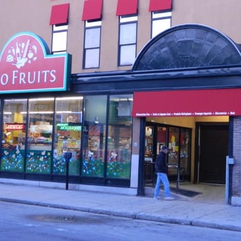 Exo Fruits - a woman walking past a store - Fruits & Veggies Near Me - Montreal, Quebec Exo Fruits - a woman walking past a store - Fruits & Veggies Near Me - Montreal, Quebec
