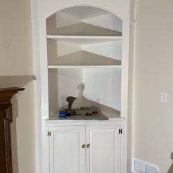 Bunting Home Improvements - Newly remodeled room with corner built in cabinet.
