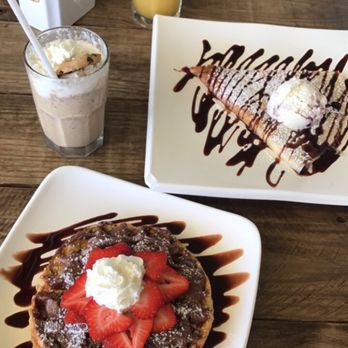 Café Huayacan - Raspberry cheesecake crepe and Nutella strawberry waffle. Yum! - Coffee & Tea Near Me - Cancún, ROO Café Huayacan - Raspberry cheesecake crepe and Nutella strawberry waffle. Yum! - Coffee & Tea Near Me - Cancún, ROO
