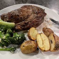 Hotel Rumford Western Maine's Sports Bar - Ribeye Steak with garlic broccoli and potatoes