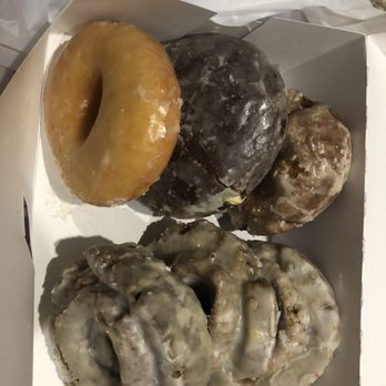 Mr Ronnie's Famous Hot Donuts - From top left to bottom right; plain glazed, chocolate shell with creme, pumpkin spice glazed, devils food glazed, blueberry glazed - Bakeries Near Me - Houma, Louisiana Mr Ronnie's Famous Hot Donuts - From top left to bottom right; plain glazed, chocolate shell with creme, pumpkin spice glazed, devils food glazed, blueberry glazed - Bakeries Near Me - Houma, Louisiana