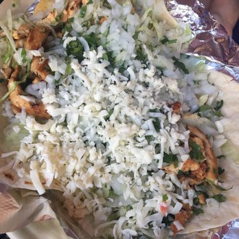 Los Amigos - Chicken tacos with flour tortillas, lettuce, cheese, onions & cilantro - Mexican Near Me - Portage, Michigan