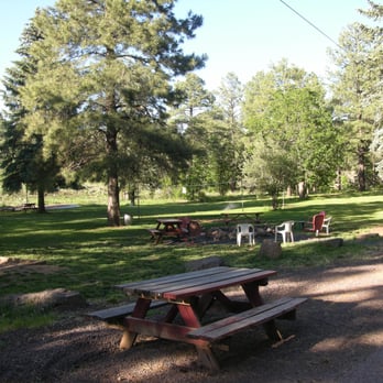 Rainbow Lake Lodge - Common area features volleyball, basketball, tetherball, horseshoes, picnic tables, BBQ grills, and an outdoor fire pit. - Hotels Near Me - Lakeside, Arizona Rainbow Lake Lodge - Common area features volleyball, basketball, tetherball, horseshoes, picnic tables, BBQ grills, and an outdoor fire pit. - Hotels Near Me - Lakeside, Arizona