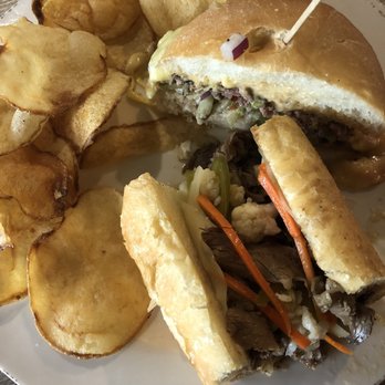 RANGE kitchen & tap - My friend and I split the beef sandwich and the burger - New American Near Me - Roseville, California RANGE kitchen & tap - My friend and I split the beef sandwich and the burger - New American Near Me - Roseville, California