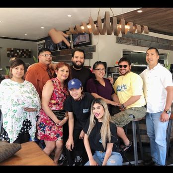 Crooked Gaff Kitchen - Photo with our waiter. - Seafood Near Me - Whittier, California