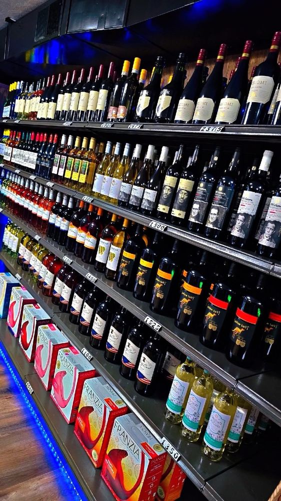 Caledonia Package Store Logo