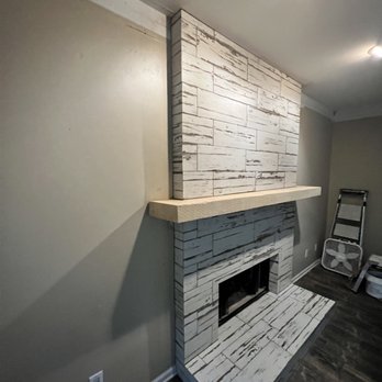It’s Handled By Daniel - Fireplace surround with mitered edges and floating mantle. - Tiling Near Me It’s Handled By Daniel - Fireplace surround with mitered edges and floating mantle. - Tiling Near Me