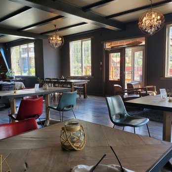 One Love Carribean Cafe - tables and chairs - Desserts Near Me - Canmore, Alberta One Love Carribean Cafe - tables and chairs - Desserts Near Me - Canmore, Alberta