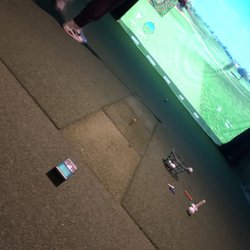 Inside Edge Golf - Screen action.. More like hitting mat action