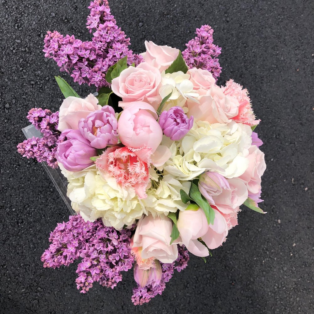 Miss Daisy - Lilacs, hydrangea, roses, tulips, and parrot tulips fill this gorgeous Mother's Day arrangement - Florists Near Me - Las Vegas, Nevada Miss Daisy - Lilacs, hydrangea, roses, tulips, and parrot tulips fill this gorgeous Mother's Day arrangement - Florists Near Me - Las Vegas, Nevada