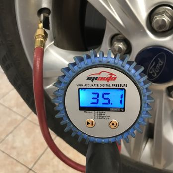 Daves Auto Service - Checking air pressure in a cars tire. - Auto Repair Near Me - Boyertown, Pennsylvania