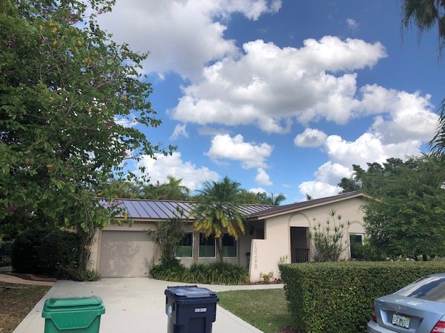 Slide of South Miami Roofing