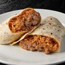 Fuego Cravings - Zoomed in photo of our BRC burrito. A 13" flour tortilla filled with hearty beans, fluffy rice, and shredded cheese.