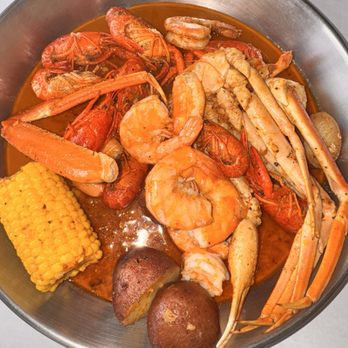 Storming Crab - Create Your Own Combo 1/2 lb snow crabs 1/2 lb head off shrimp 1/2 LB Crawfish Added boiled egg Crajun flavor Hot for the heat - Seafood Near Me - Rockford, Illinois Storming Crab - Create Your Own Combo 1/2 lb snow crabs 1/2 lb head off shrimp 1/2 LB Crawfish Added boiled egg Crajun flavor Hot for the heat - Seafood Near Me - Rockford, Illinois
