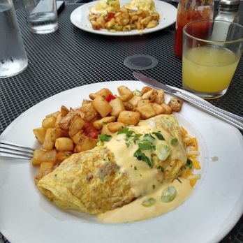 Rhodeside Grill - This is quite possibly the best omelet I've ever had. The sausage is flavorful and the hollandaise is the perfect complement. - American Near Me - Arlington, Virginia Rhodeside Grill - This is quite possibly the best omelet I've ever had. The sausage is flavorful and the hollandaise is the perfect complement. - American Near Me - Arlington, Virginia