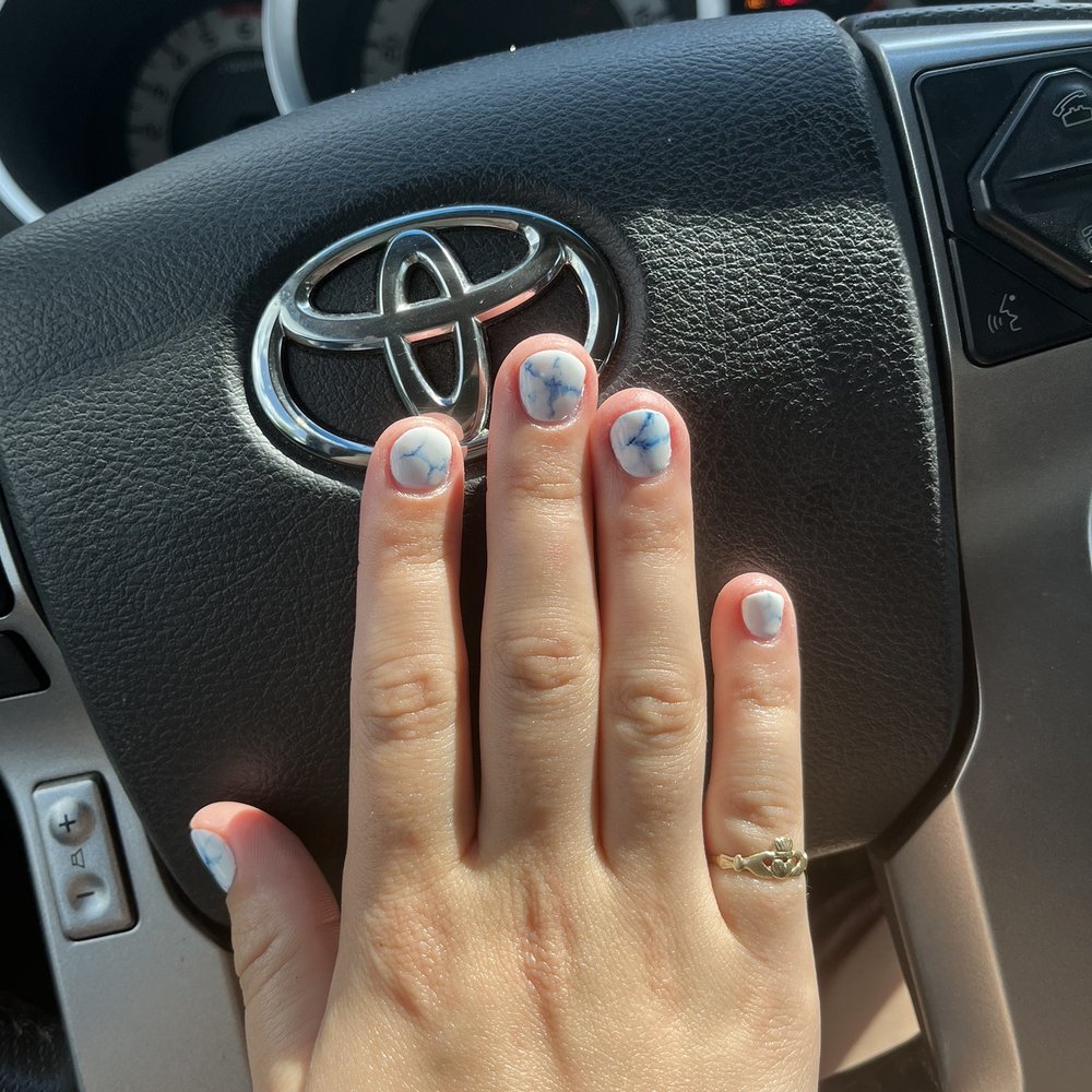 My nails completed while they were working on my truck!
