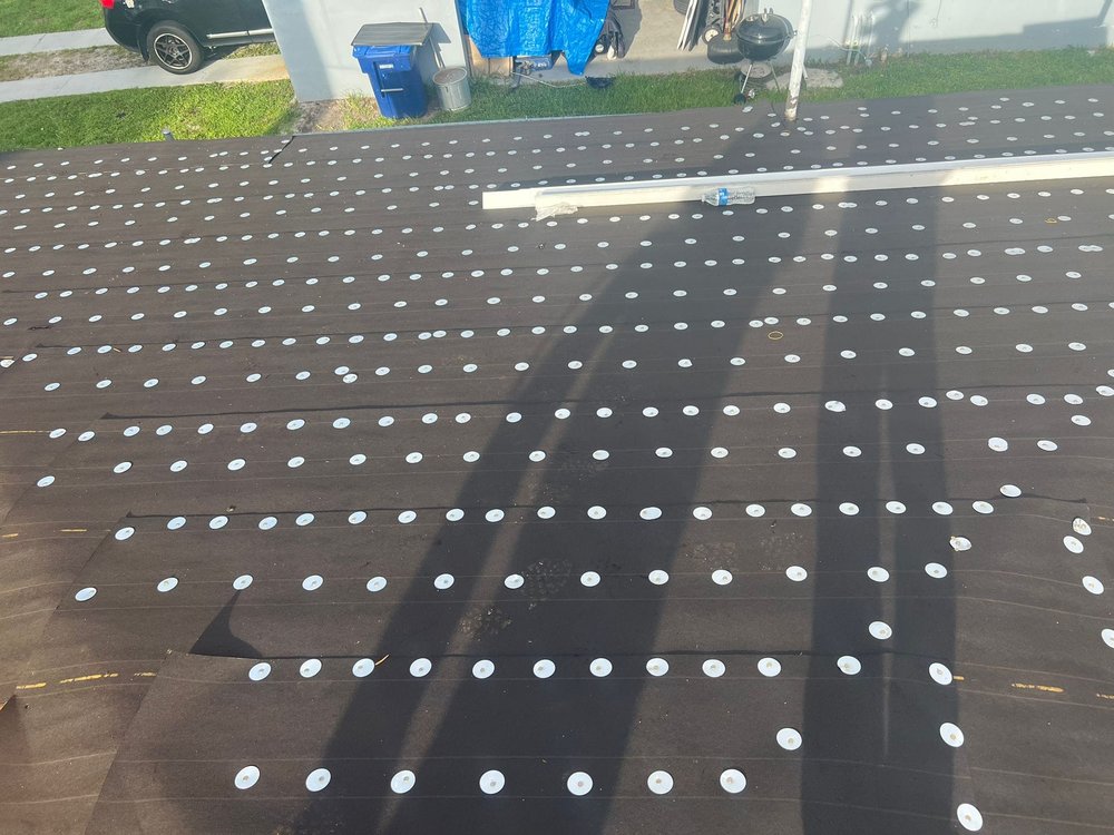 Slide of Advanced Roofing & Construction